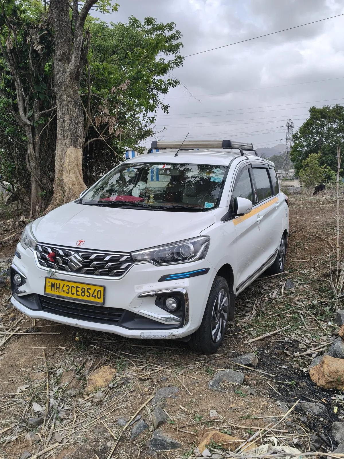 The Ertiga with the roof carrier on a ghat road